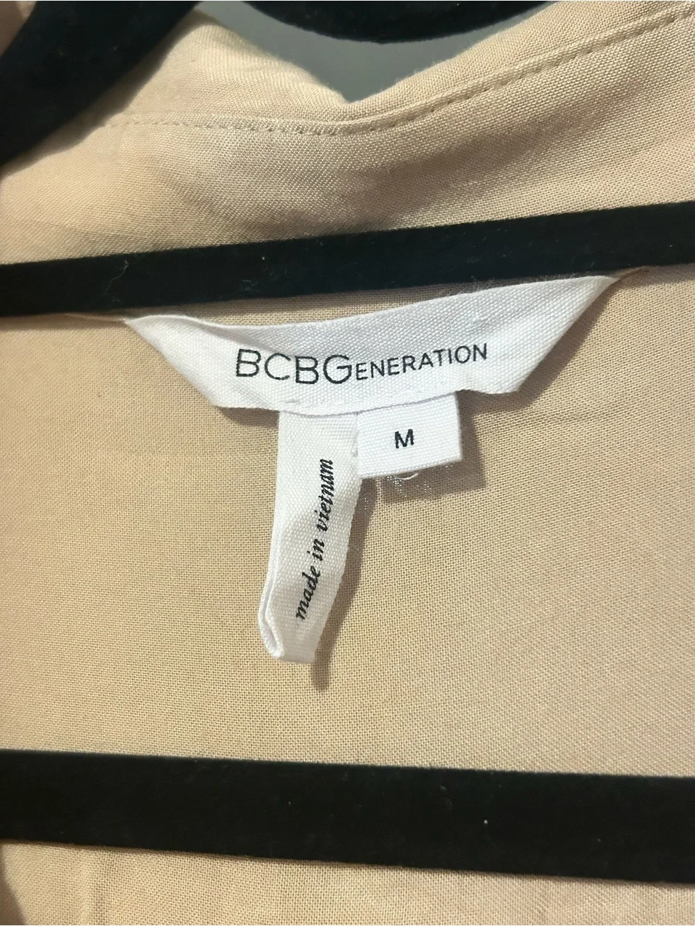 BCBGeneration Beige and Black Trim Long Sleeve Romper